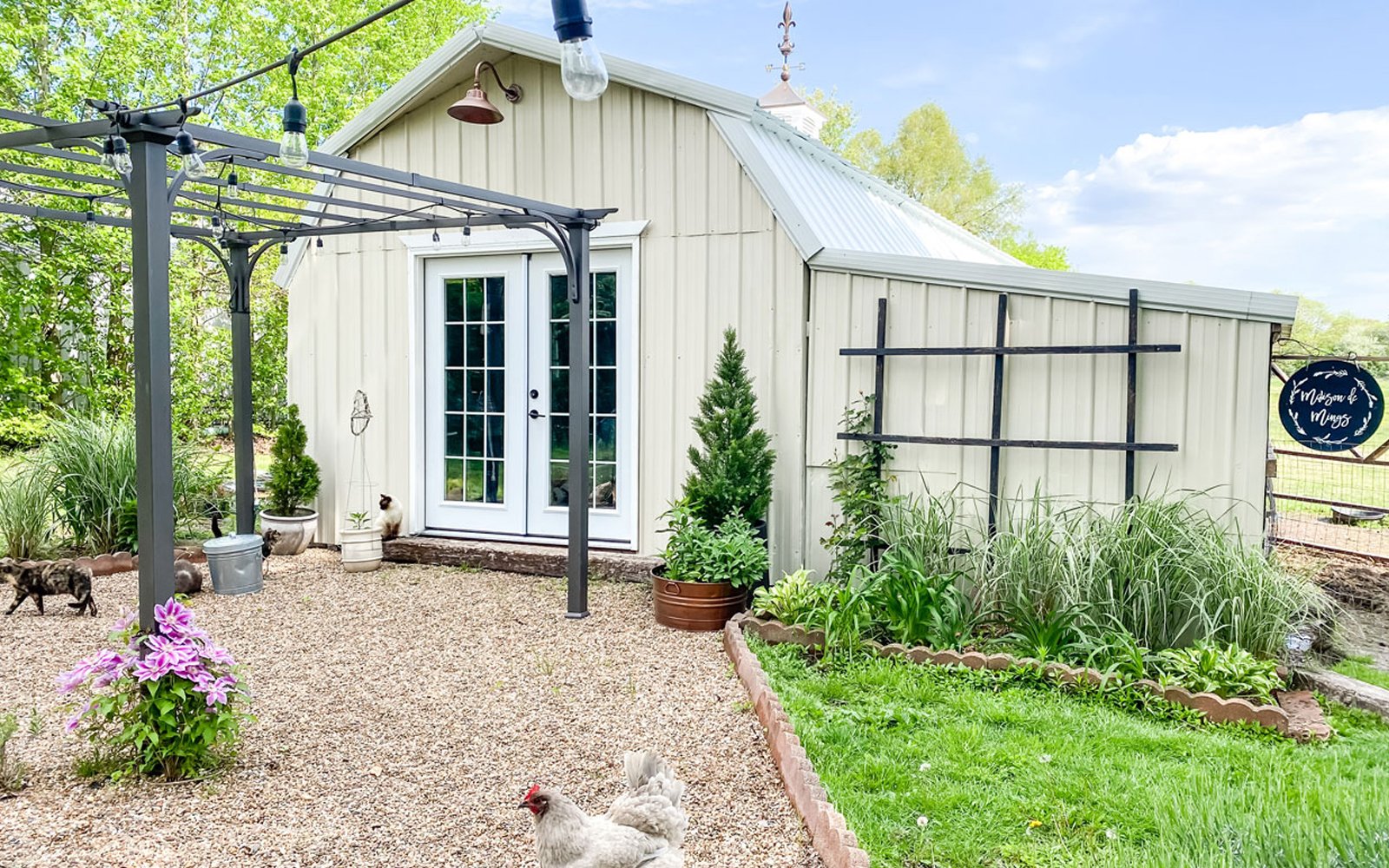 farmhouse barn with modern french doors with lots of windows and hardware from viaggio