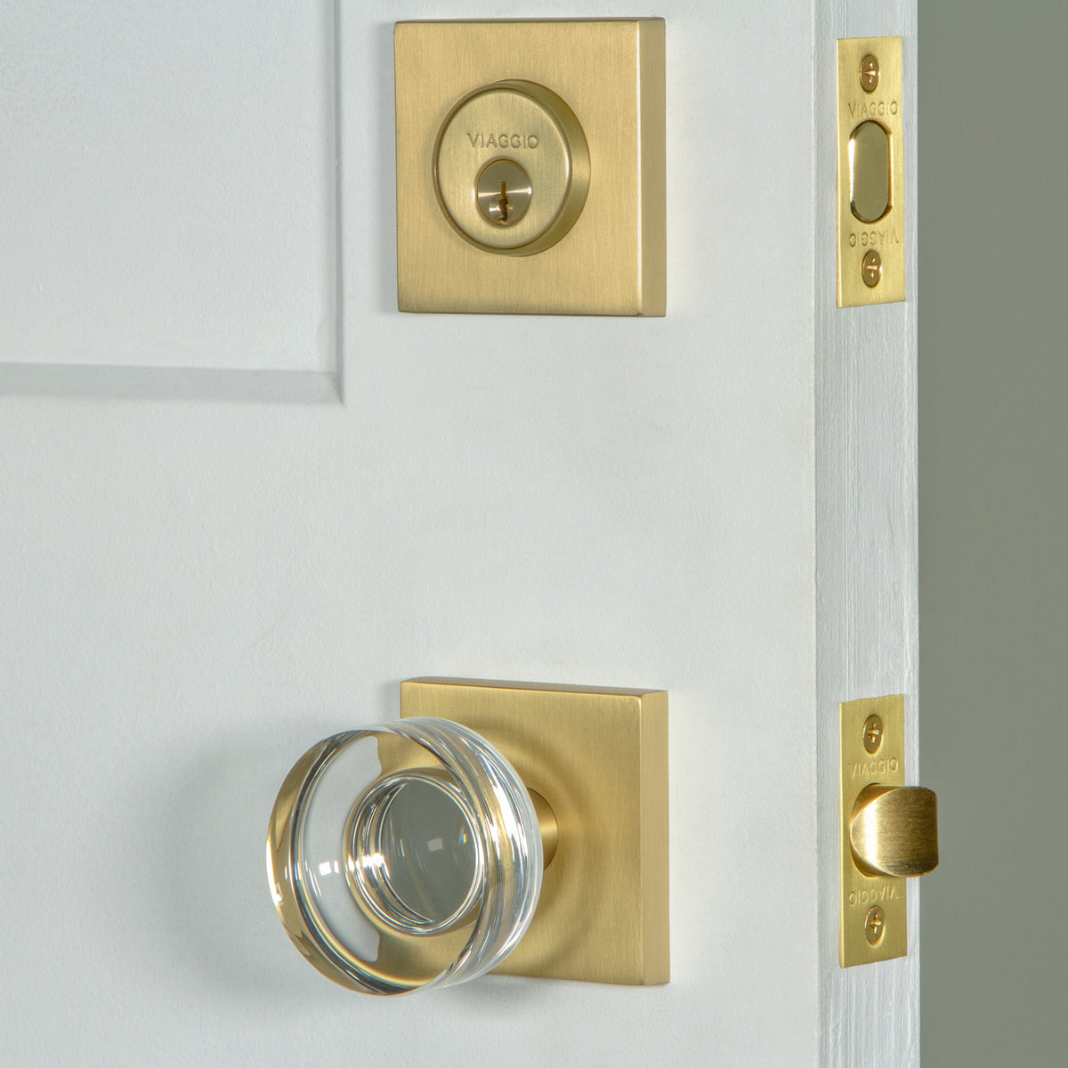 Quadrato Rosette Entry Set with Circolo Crystal Knob in Satin Brass