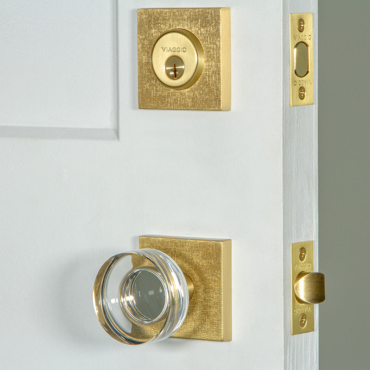 Quadrato Linen Rosette Entry Set with Circolo Crystal Knob in Satin Brass