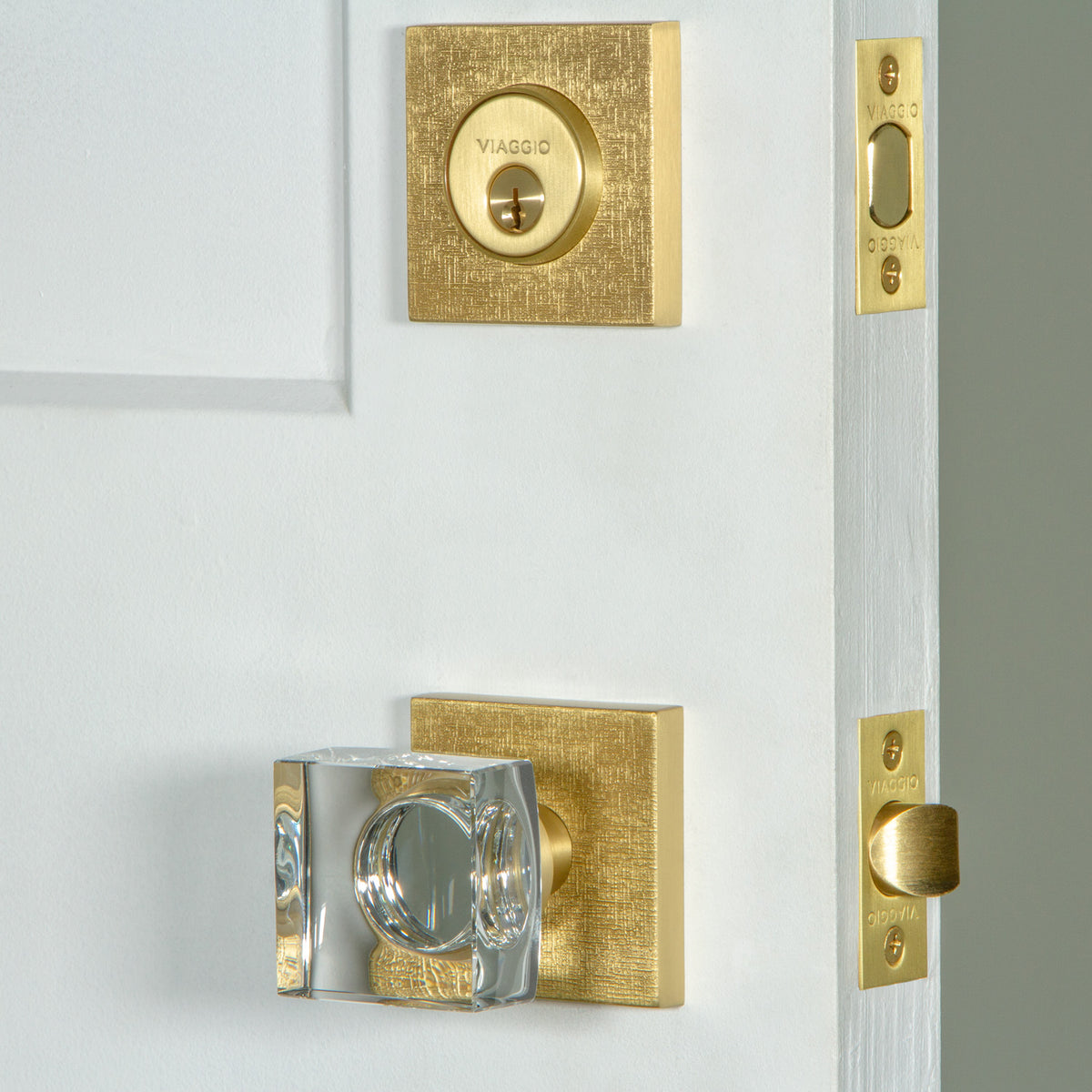 Quadrato Linen Rosette Entry Set with Quadrato Crystal Knob in Satin Brass