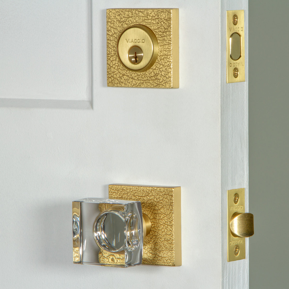 Quadrato Leather Rosette Entry Set with Quadrato Crystal Knob in Satin Brass